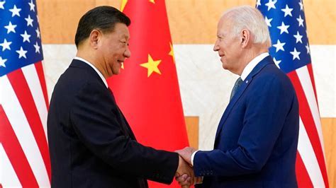 chinese and pakistani military leaders shaking hands during defense partnership meeting in beijing