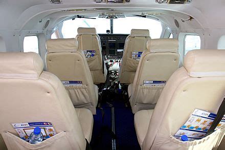 chinese-assembled cessna 208 caravan on ramp with CAIGA logos