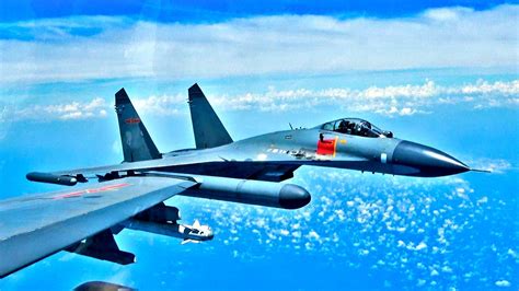 Chinese J-11 fighter dangerously close to B-52 over South China Sea, Oct 2023
