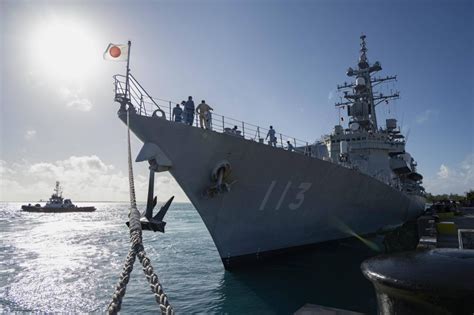 Chinese PLAN warship shadowing Japanese MSDF vessel near disputed maritime boundary