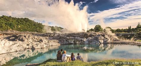 chinese tourists exploring rotorua geothermal attractions new zealand