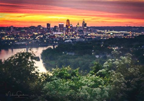 Cincinnati drone flying over Price Hill neighborhood with city skyline in background
