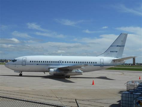 classic Boeing 737-200 narrowbody aircraft climbing after takeoff