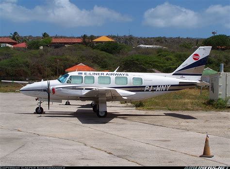 Close-up of E-Liner Airways Piper PA-31 Navajo Chieftain on the tarmac in Bonaire