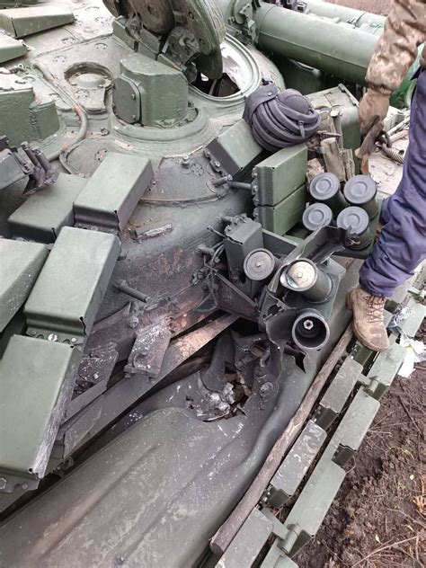 close-up of t-90m turret showing relikt reactive armor and thermal sight module