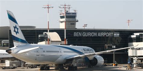 closed departure boards showing Tel Aviv, Beirut, Tehran at major European airport terminal