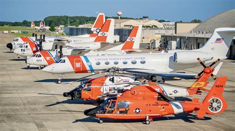 Coast Guard aircraft hangar with old and new jet models visible