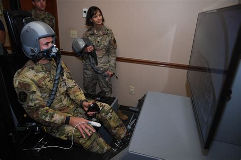 cockpit crew during high-stress simulation monitored by aviation psychology team