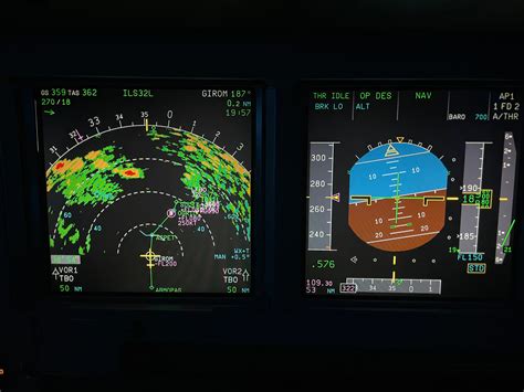 cockpit navigation display showing nautical miles flight route over world map