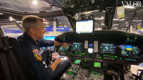 cockpit of modern s-70i firehawk helicopter showing advanced avionics