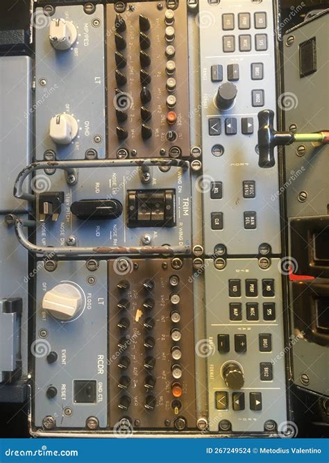 cockpit radio panel close-up showing aviation communication frequencies in use