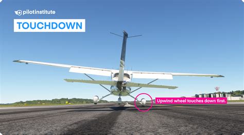 cockpit view during crosswind landing with visible rudder pedal input and runway alignment