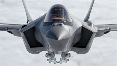 cockpit view from f-35 with strike mission interface visible