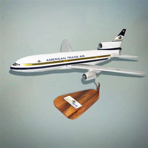 Collection of detailed mahogany aircraft models on display