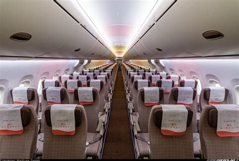 COMAC C919 cabin interior wider aisle modern narrowbody seating
