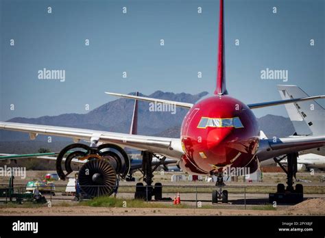 commercial airliners parked in rows at Pinal County Airpark