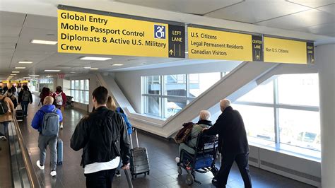 Concerned passengers boarding a Boeing 787 Dreamliner at JFK International Airport