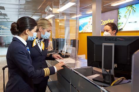 Condor customer service desk at Zurich airport handling compensation claims