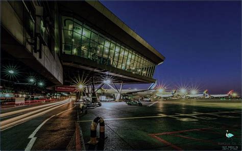 construction crew reinforcing OR Tambo terminal roof with waterproof coating and upgraded sprinkler heads