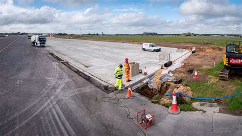 construction crews upgrading taxiway and airfield facilities on Wake Island