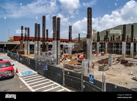construction site of Cyril E. King Airport’s modernization project with cranes and workers
