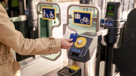 contactless tap gate with Apple Pay being used at Gatwick train station