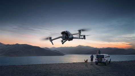 contents of dji air 3s fly more combo laid out on wooden table