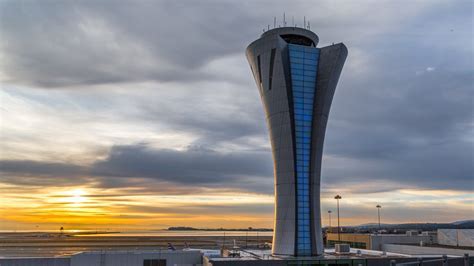 control tower at Copenhagen Airport with skyline in background