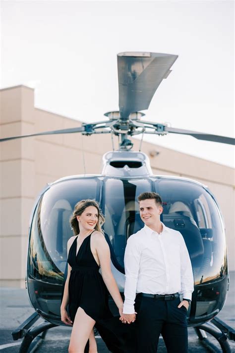couple celebrating engagement during private helicopter flight in Chicago