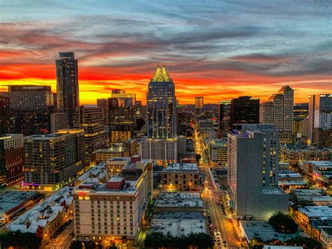couple celebrating in helicopter during Austin sunset tour