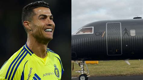 CR7 branded private jet parked on airport ramp at sunset