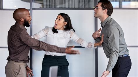 crew member mediating a team dispute with manager support