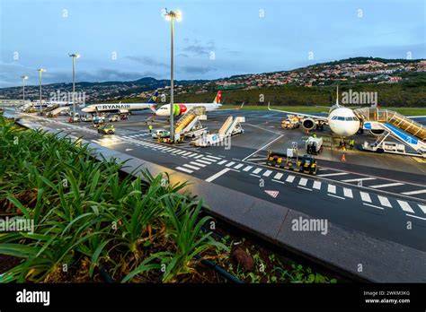 Cristiano Ronaldo International Airport Madeira elevated runway over Atlantic Ocean at night