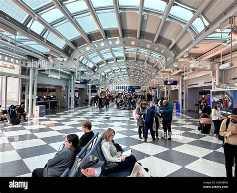 crowded passenger terminal inside Chicago O’Hare International Airport