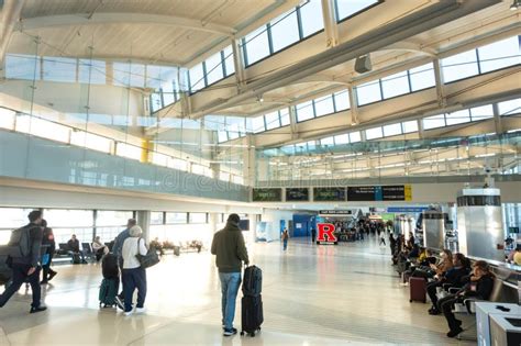Crowded terminal at Newark Liberty International Airport during delays