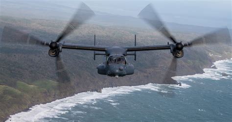 CV-22 Osprey in forward flight over mountainous terrain
