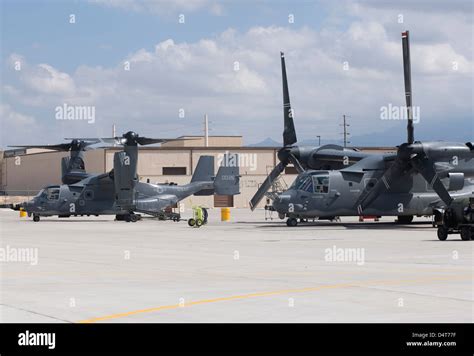 CV-22 Osprey landing at Kirtland Air Force Base with mountains in background