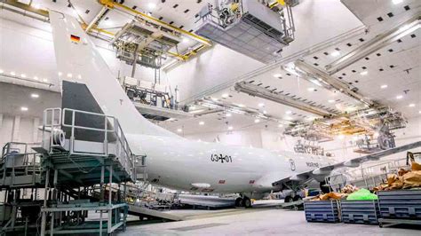 Danish defense officials signing P-8A procurement agreement with Boeing executives