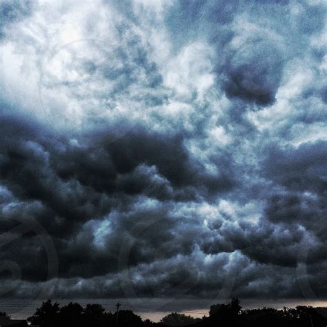 dark cumulonimbus cloud with gray base during pre-rain conditions