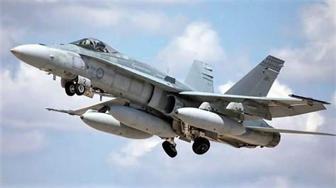 Decommissioned F/A-18 Hornets in storage, showcasing structural durability