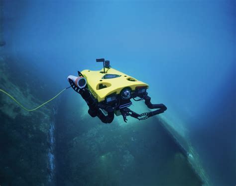 deep sea robot inspecting submarine debris field ocean floor