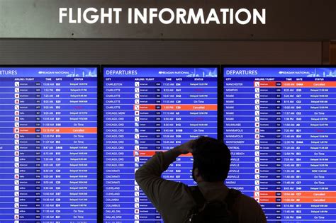delayed departure boards across major U.S. airports following July storm disruptions