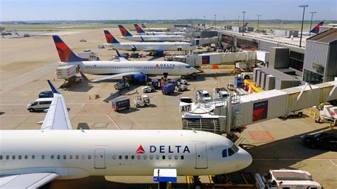 Delta Air Lines aircraft lineup at New York JFK terminal