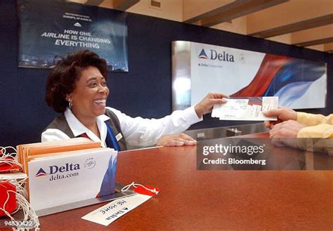 delta air lines customer support desk with travelers post diversion incident