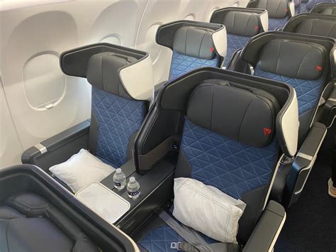 Delta Air Lines domestic first class cabin wide leather seats and premium cabin layout