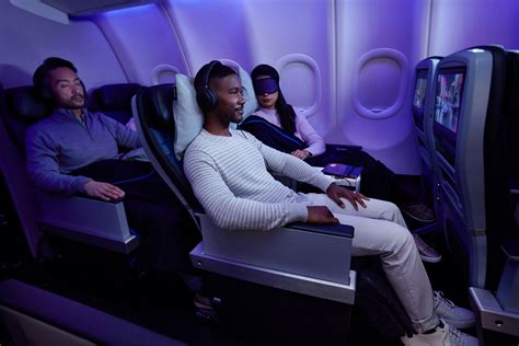 Delta Air Lines Premium Select seat with footrest and large inflight entertainment screen