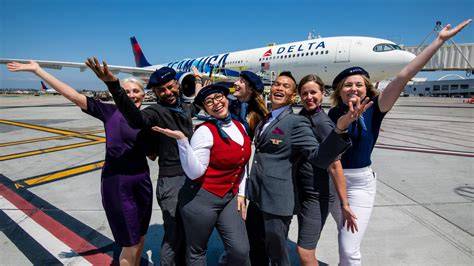 Delta Air Lines senior flight attendants serving passengers aboard an Airbus A350