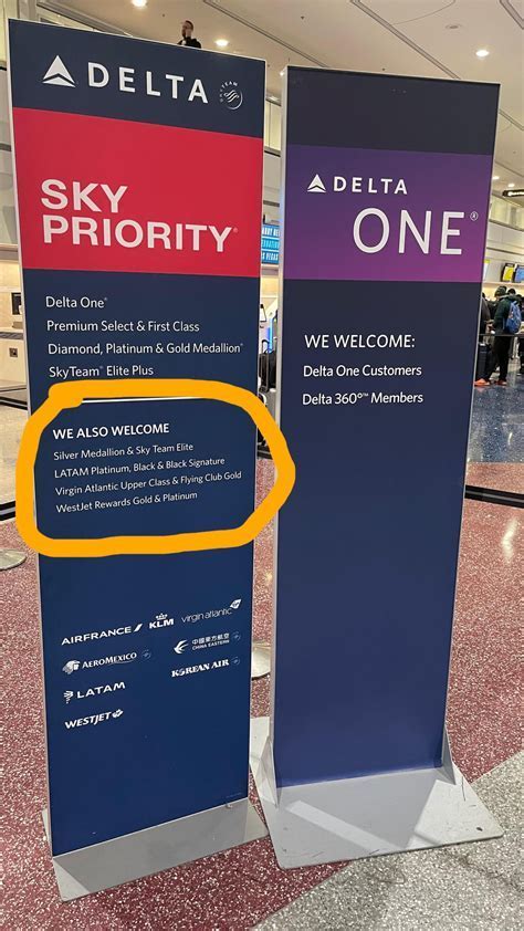 delta air lines sky club and medallion membership banner in airport lounge