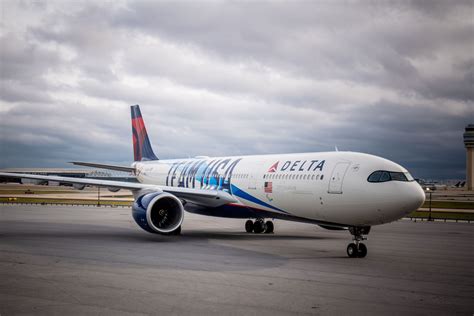 Delta Airbus A330-900 at London Heathrow Airport terminal