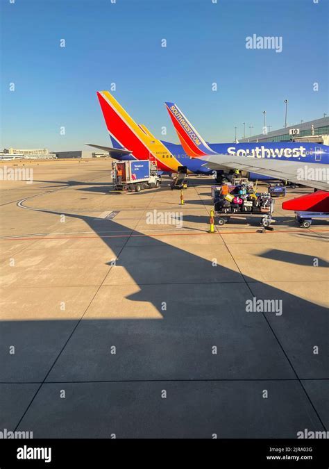 delta aircraft at austin airport runway with skyline background